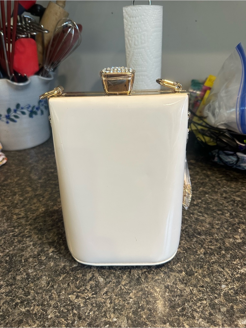 Elegant Cream Patent Clutch with Gold Accents